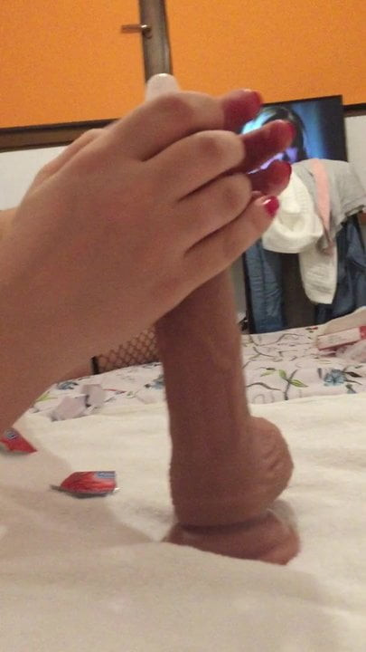 My wife Vicky put the cundom on dildo