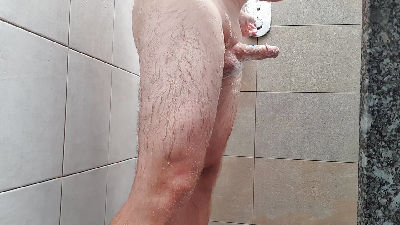 Horny cock shaved in the shower and cumshot