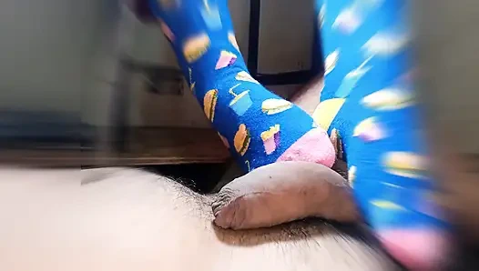 straw with feet wearing very funny stockings