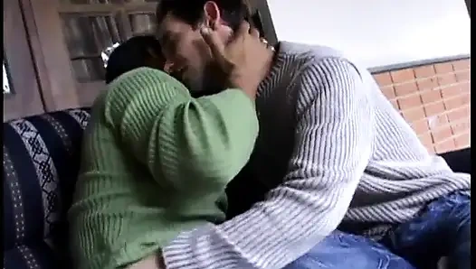 Bisexual duo share a redhead on patio sofa