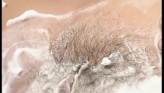 She shaves her pussy and then fingers it