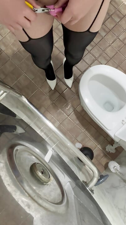A pathetic girl who breaks her own chastity key and flushes it down the toilet