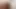 Masturbating while taking enema expelling in bathtub.