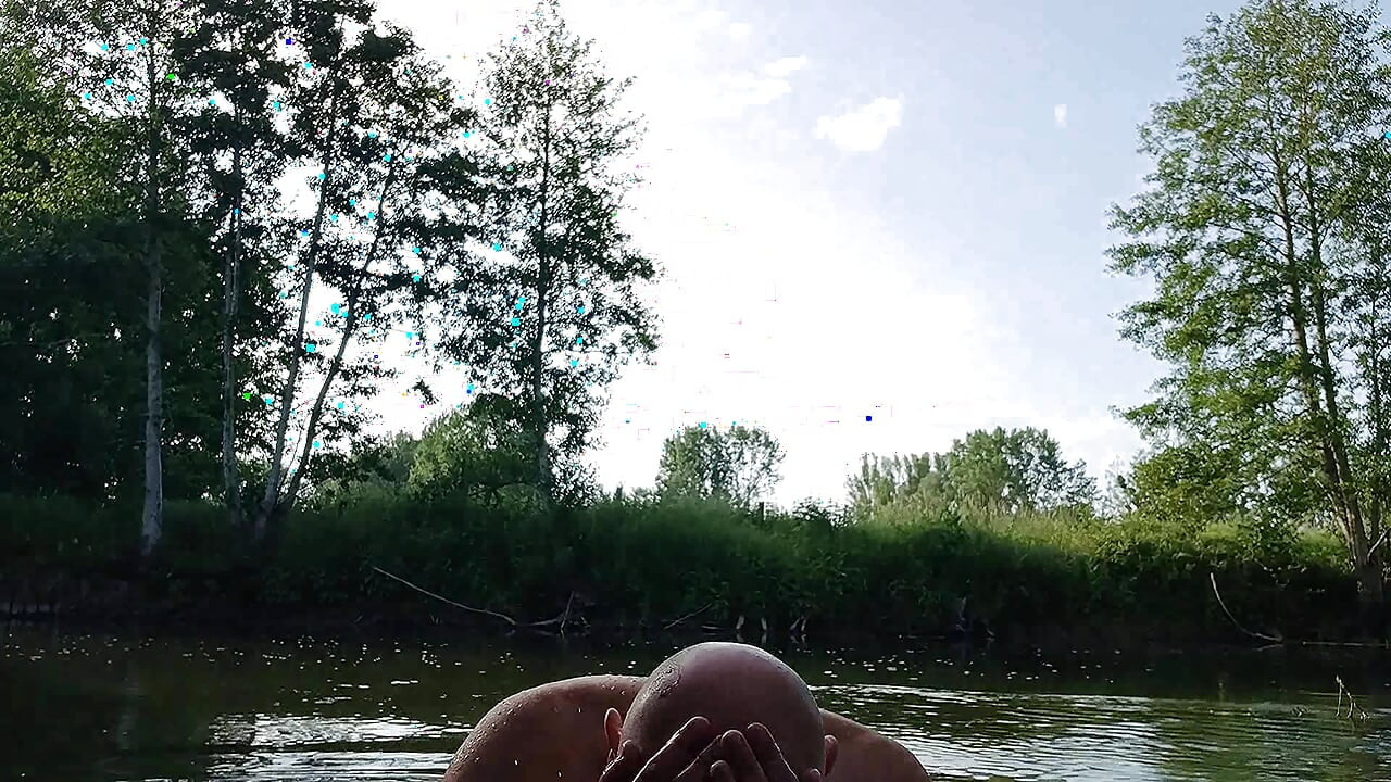 The plump, mustachioed daddy is having a blast in the stream, shamelessly masturbating with mud