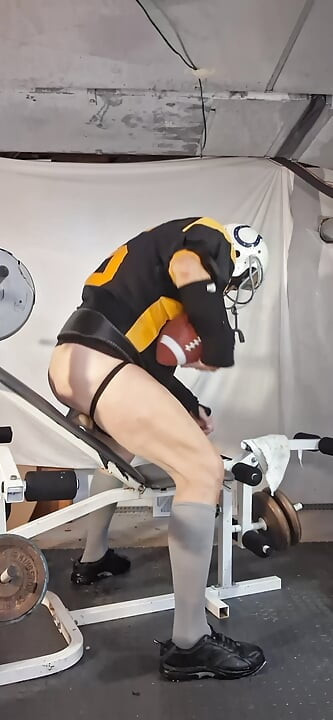 Football jock takes it after practice