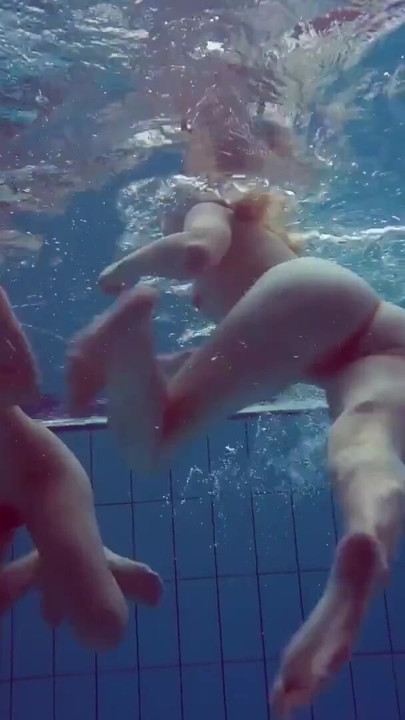 Blonde and Brunette babes swim naked | Clip 1