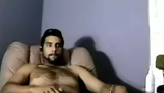 Bearded dude with hair on chest jerks off in amateur video