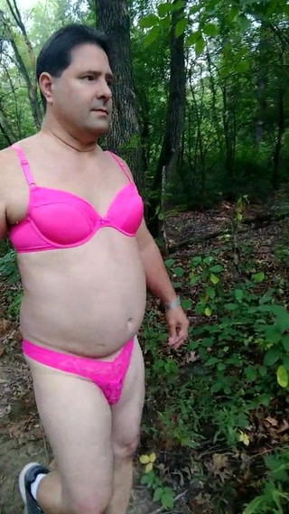 Sissy walking in the woods