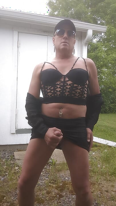 Mature crossdresser outdoors masturbation cum kicking