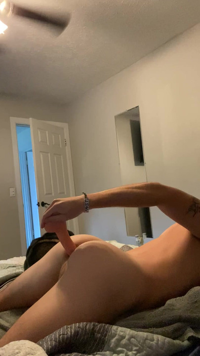 Horny fit twink moans in pleasure while fucking himself