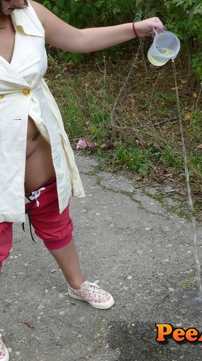 Dirty blonde filling a jar with her pee outdoor - 4K