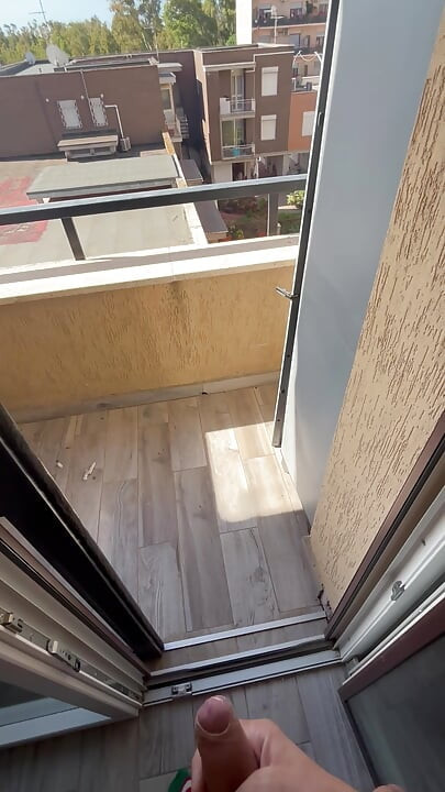 Too horny I cummed from the balcony almost caught by the neighbors