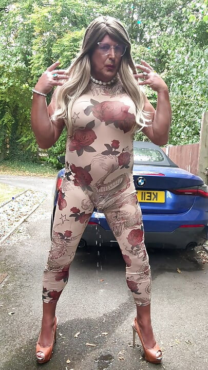 Sexy Crossdresser kellycd2022 in sexy floral see thru catsuit and heels