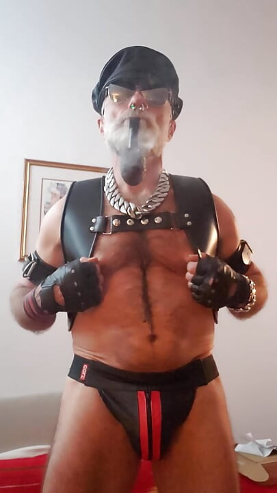 Cigar Stepdad Enjoyin Pipe with a New Pair of Nipple Clamps From Meo.de, Waiting for a Boy to Come and Play with Them