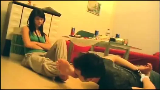 Licking her young feet