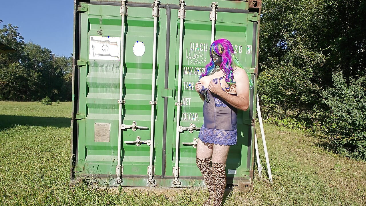 Gigantic fake tits crossdresser in lingerie masturbating outside