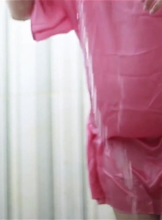 Indonesian Porn Peeping at a Busty Girl Taking a Bath in a Transparent Satin Dress