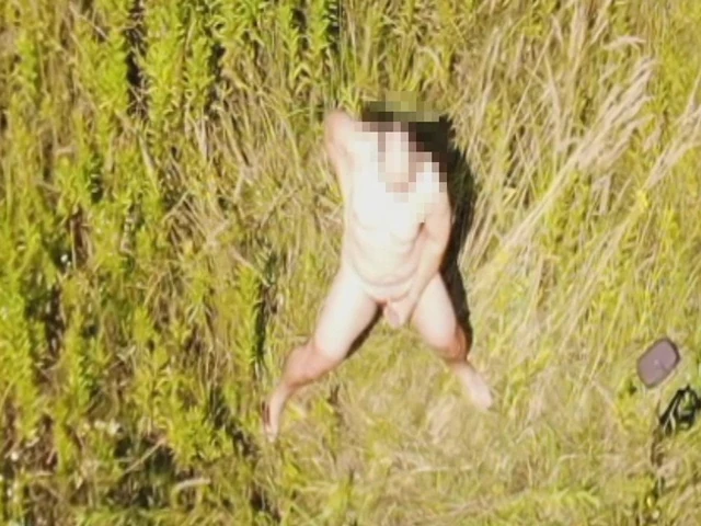 Drone view of naked masturbator