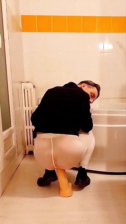 Dildo Riding in the Bathroom Wearing an Open White Pantyhose