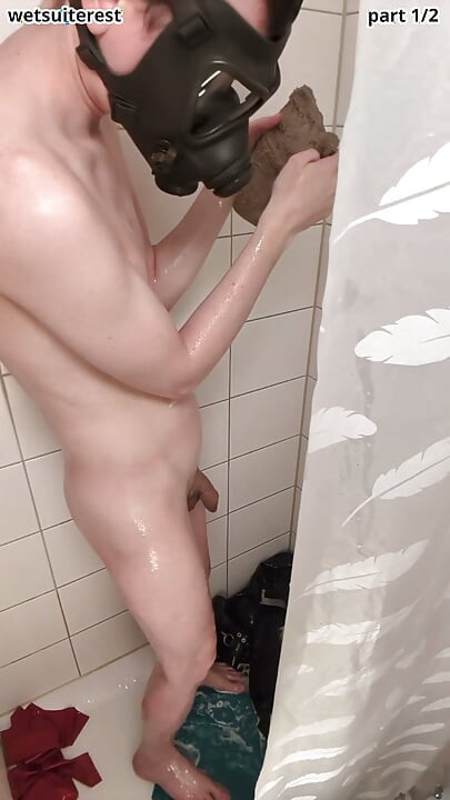 Twink showering with gas mask
