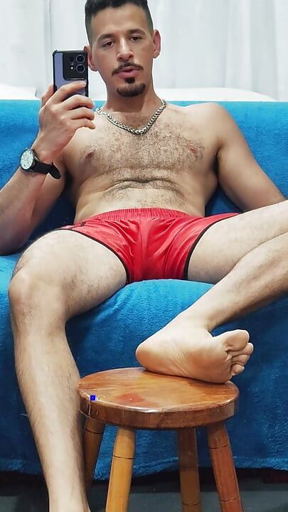 Teasing with red football shorts
