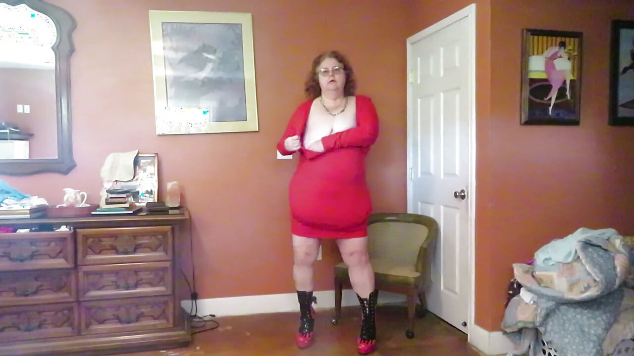 Strip tease from red dress and flaming boots part 1