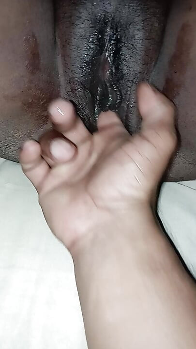 Massage the wife's pussy with fingers and make her cum