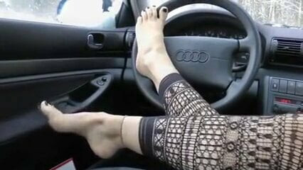 PRETTY FEET IN THE CAR