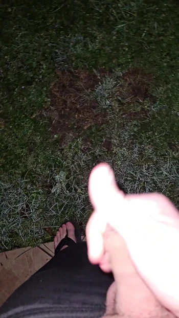 Cumshot outdoors at night