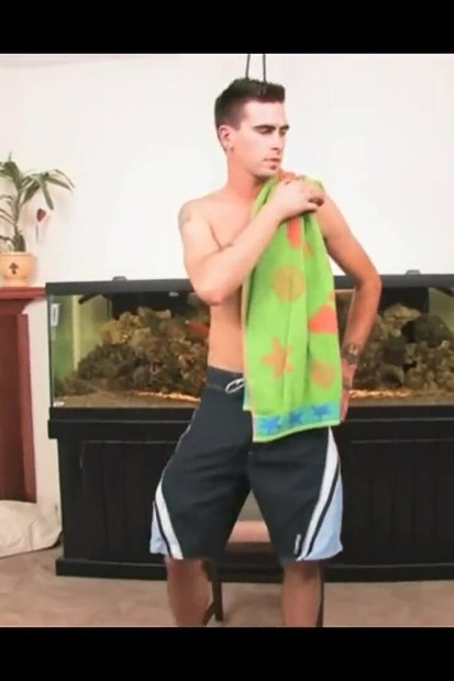 Tattooed Dude Ijerks Himself in Front of Fish Tank