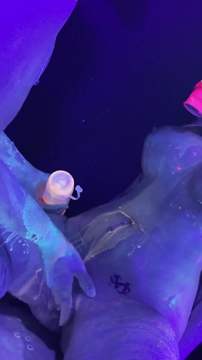 Neon Rave Girl on Girl Dildo Play