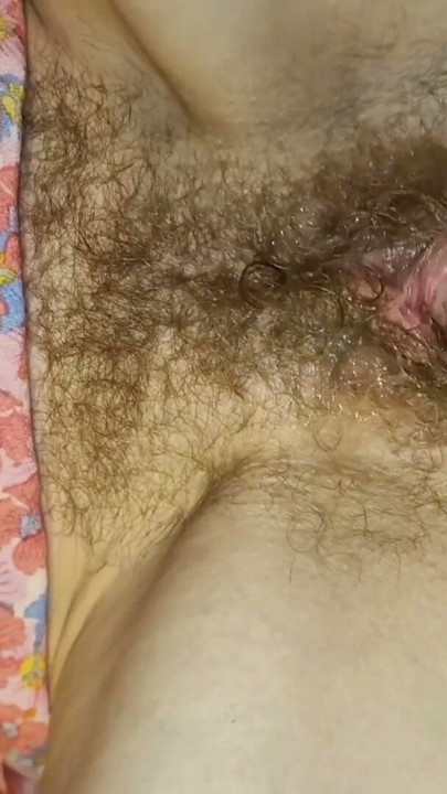 He fucks her with his whole hand while she watches porn. Her pussy is wet and stretched. | Clip 1