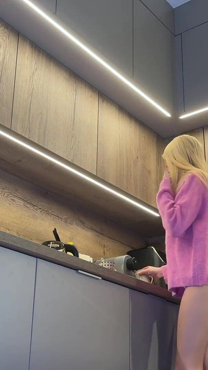 Iconic moment from "Hot petite skinny blonde girlfriend is in the kitchen teases me with her pink pull over"