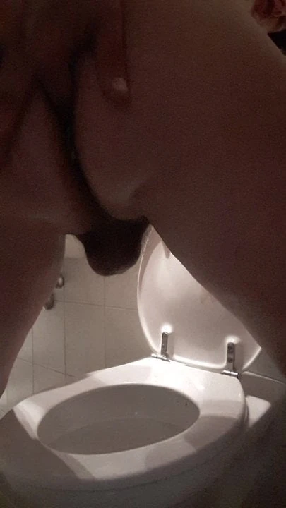 chubby jonny stuffs a condom in his ass