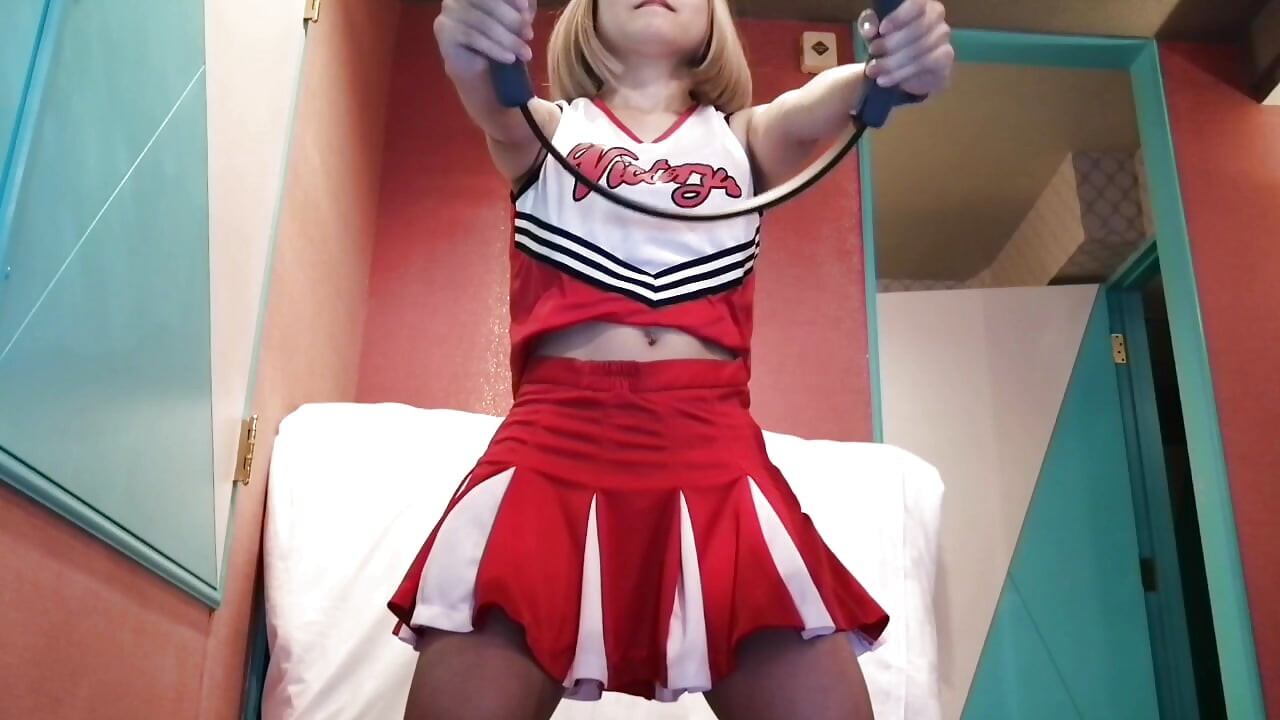 A cute, busty married woman does five exercises in a sexy cheerleader costume. Peeking down from below. Home made amateur Private Shoot