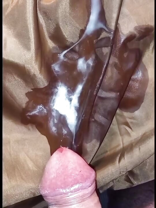 2 cumshots on the shiny lining of a lady puffercoat