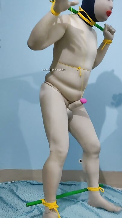 Zentai CBT penis tie walking slave
