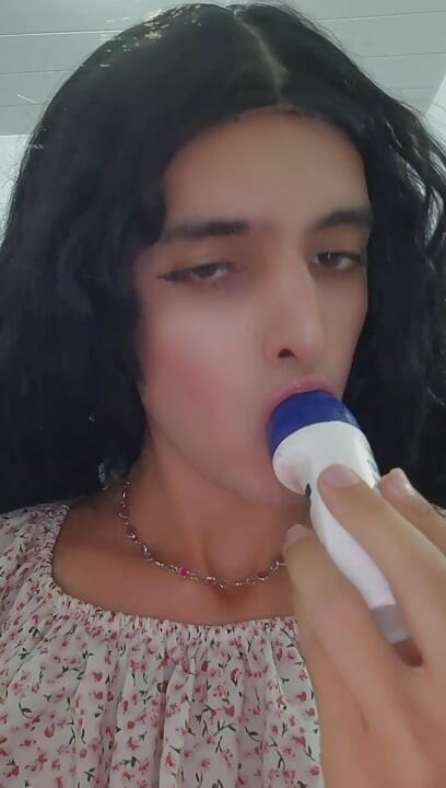 Petite trans girl sucks on deodorant