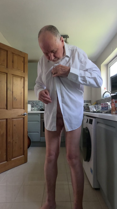 Stripping naked in the kitchen