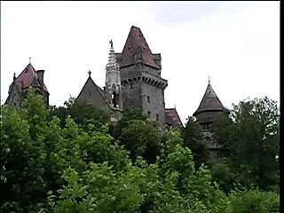 Sexy mistress in leather spanks the slut