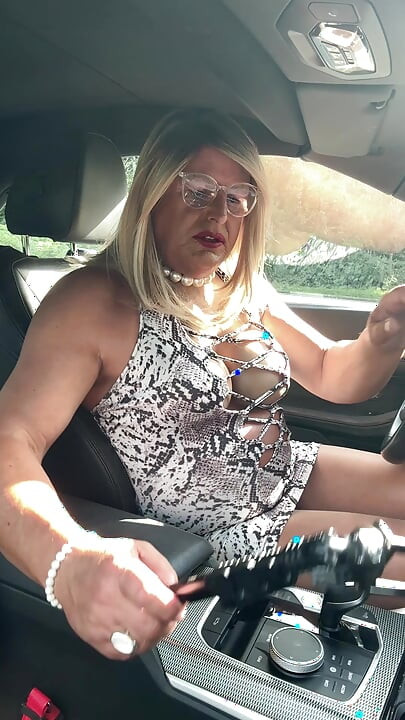 Sexy Crossdresser kellycd2022 in white animal print and pantyhose enjoying an afternoon drive