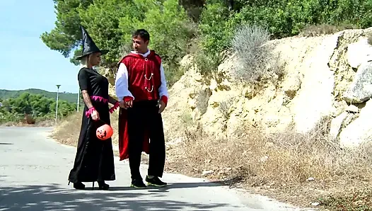 Hot blonde with big tits roughly fucked by two bad guys in the woods dressed up for Halloween