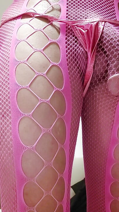 Milah shows off her pink fishnet tail