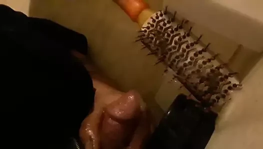Big cum load on her hair  brush