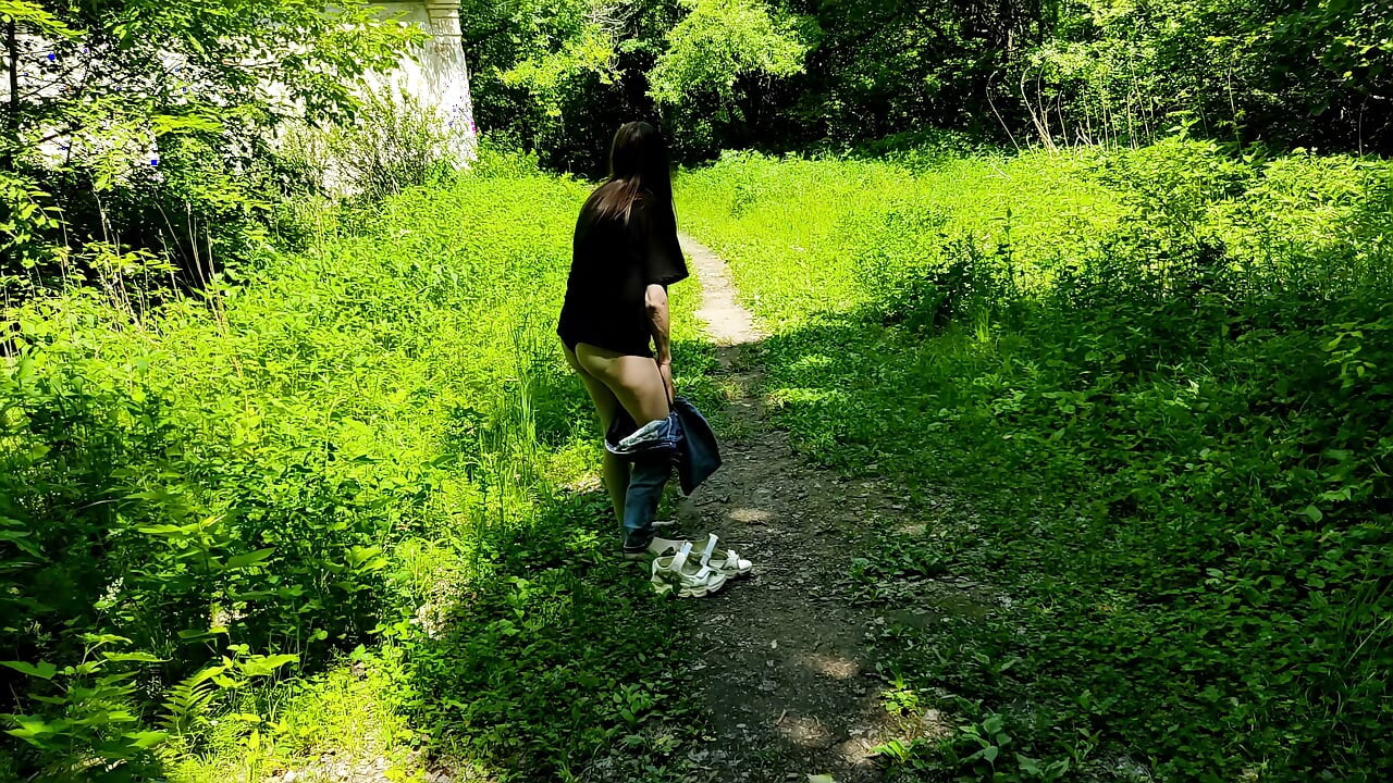 Jogging without pants in a forest park. Old video