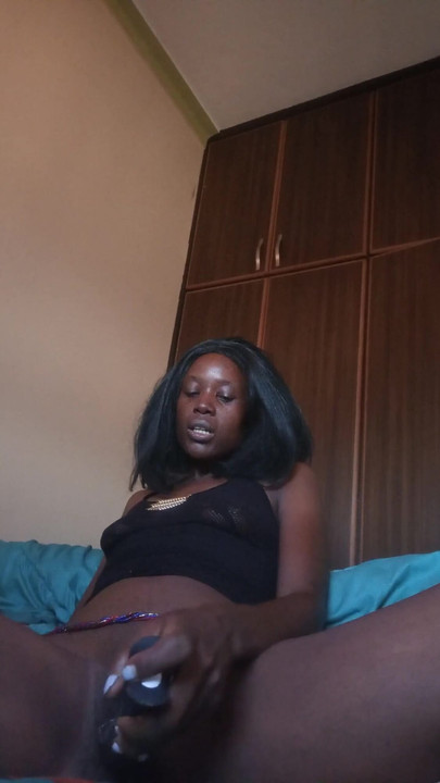 Must-see moment from "Biglips38 playing happily with beads in her waist and  black dildo and cuming quitely"