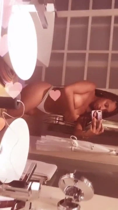 black girl showing off her booty