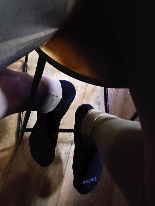 Sitting on wooden stool peeing down my legs and into my tights