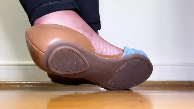 MILF Plays with Her Flats on Her Feet