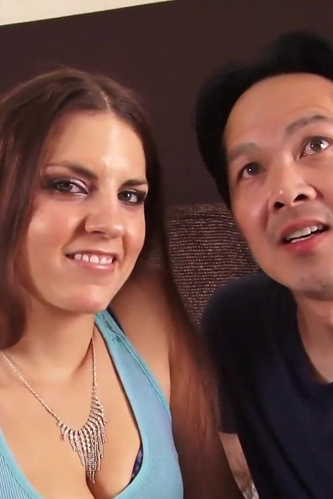 Cute brunette gives a deep blowjob to her asian lover